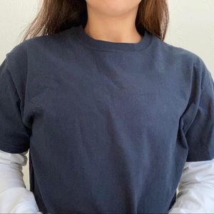 Black shirt with a white long sleeve